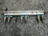 Load image into Gallery viewer, 1998 Suzuki Outboard DT225 2-stroke fuel rail and injector set 15710-92E01
