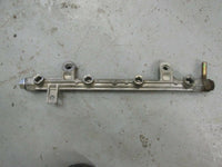 Load image into Gallery viewer, 2000 Suzuki Outboard DF 60 70 hp 07001F-033652 fuel rail 15751-99E00
