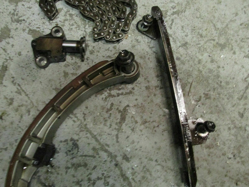 2002 Suzuki outboard DF140 14001Z-251032 4-stroke chain, tensioner + guide