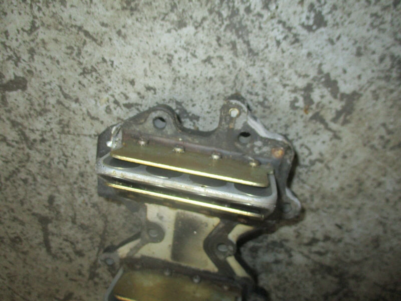 1987 Johnson outboard 40hp 2-stroke intake manifold with reeds 327126