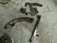 Load image into Gallery viewer, 2002 Suzuki outboard DF140 14001Z-251032 4-stroke chain, tensioner + guide
