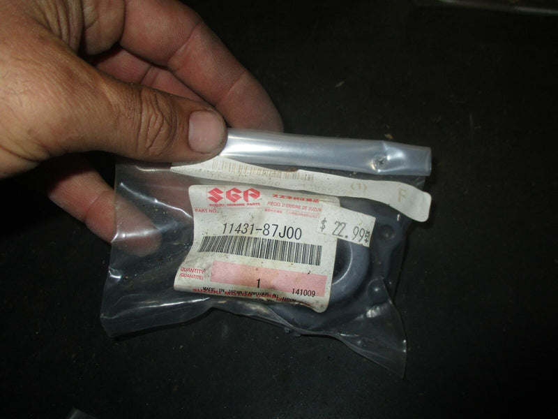 NEW OEM Suzuki outboard under oil seal housing (11431-87J00)