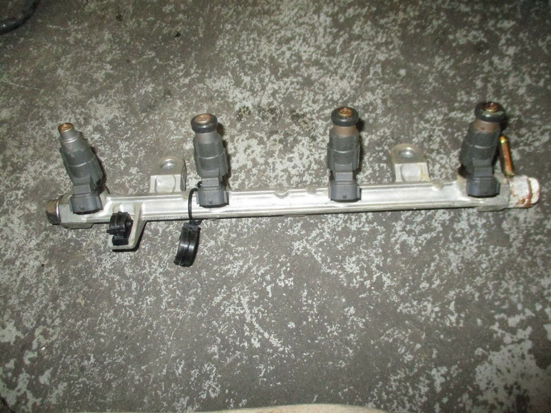 2004 suzuki DF70 4-stroke outboard fuel rail with injector set 15751-99e00