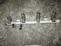 Load image into Gallery viewer, 2004 suzuki DF70 4-stroke outboard fuel rail with injector set 15751-99e00
