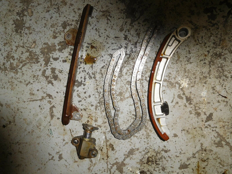 2002 Suzuki Outboard DF115 Timing Chain tensioner and guides