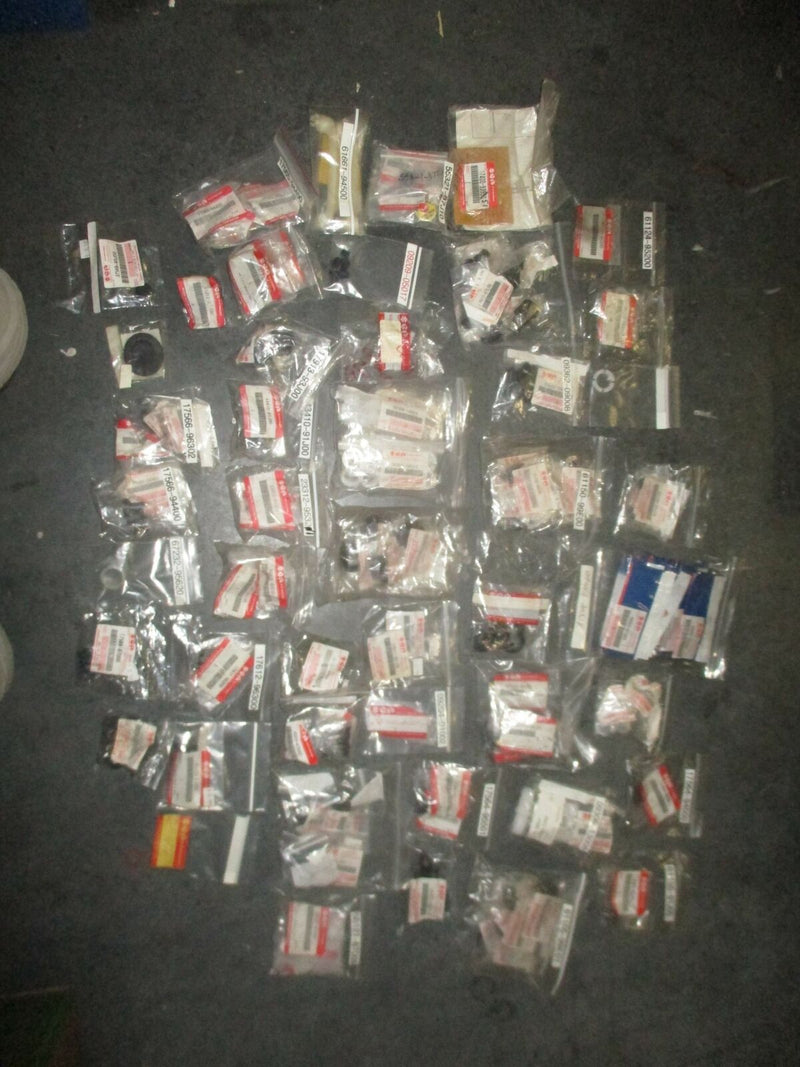 NEW OEM Suzuki outboard a box full of miscellaneous plastic and rubber hardware