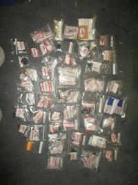 Load image into Gallery viewer, NEW OEM Suzuki outboard a box full of miscellaneous plastic and rubber hardware
