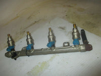 Load image into Gallery viewer, Suzuki DF70 70hp outboard fuel rail with injector set (15751-99E00)
