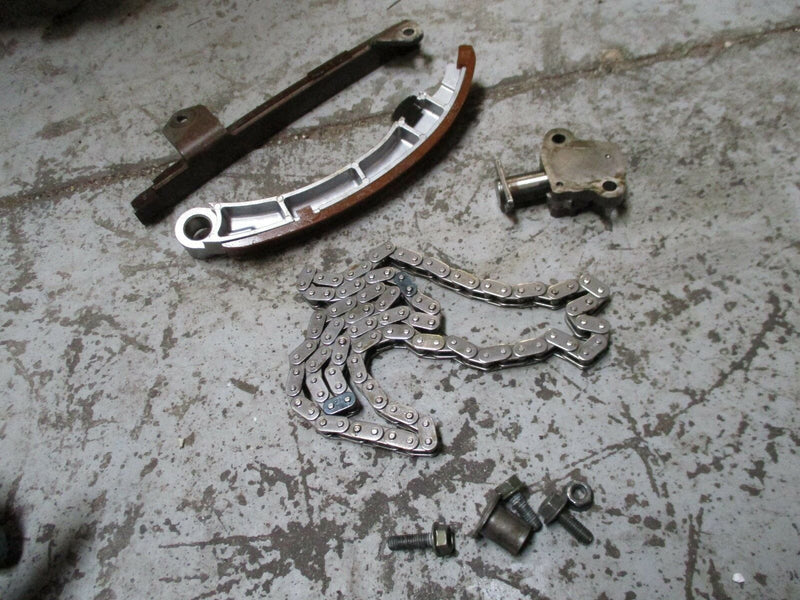 2001 Suzuki 115hp 4 stroke outboard chain/guides/tensioner 12771-90j00 12810-90j