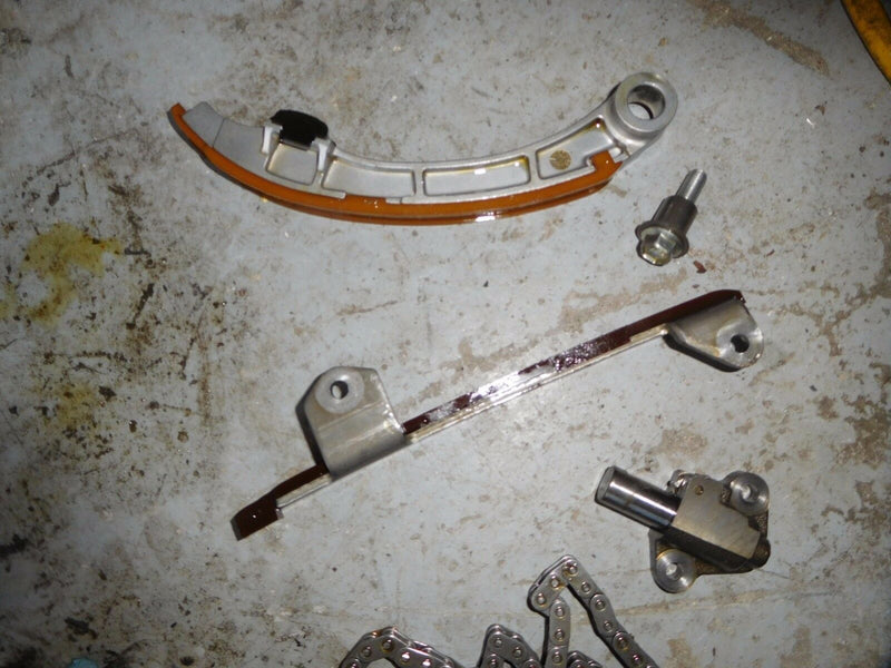 2008 Suzuki DF115 outboard timing chain tensioner and guides