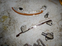 Load image into Gallery viewer, 2008 Suzuki DF115 outboard timing chain tensioner and guides
