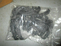 Load image into Gallery viewer, unopened bag of perko plastic fuel cap opener tool approx 25 per bag
