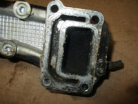 Load image into Gallery viewer, 1998 Suzuki outboard 4-stroke DF 70 hp exhaust manifold 14110-99e11
