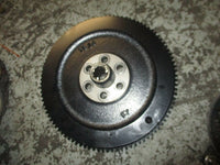 Load image into Gallery viewer, 1999 Honda BF90 outboard flywheel 28451-zw1
