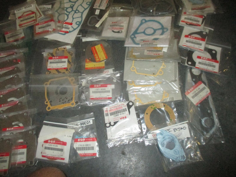NEW OEM Suzuki outboard miscellaneous small gaskets and water pump plates