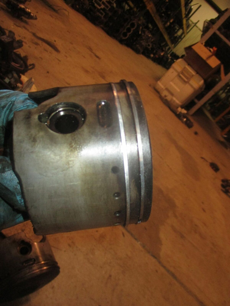 Evinrude 115hp 2 stroke outboard port piston (439865)