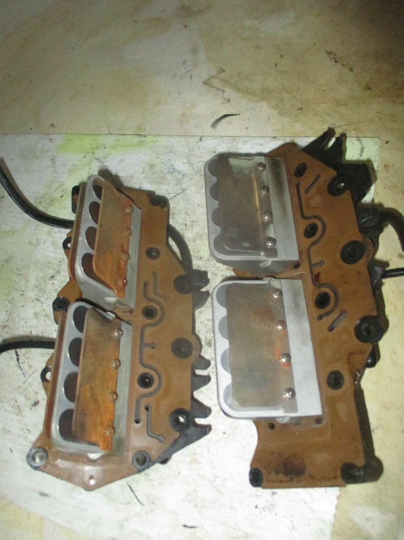 Evinrude 90hp 2 stroke outboard intake manifold with reeds