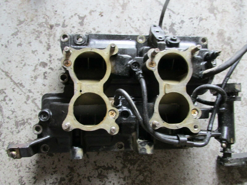 1987 Evinrude outboad E88MSLCUS 88hp 2 stroke intake manifold w/ reeds 397075