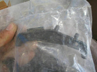 Load image into Gallery viewer, unopened bag of perko plastic fuel cap opener tool approx 25 per bag
