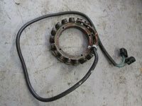Load image into Gallery viewer, 2002 Yamaha outboard Z200TXRA 2 stroke 200hp stator 68F-81410-00-00

