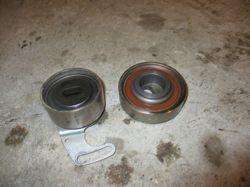 Honda BF130A 130hp outboard belt tensioner and pulley (13404-ZW5-003)