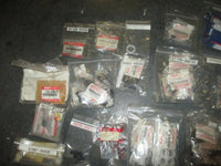 Load image into Gallery viewer, NEW OEM Suzuki outboard a box full of miscellaneous plastic and rubber hardware
