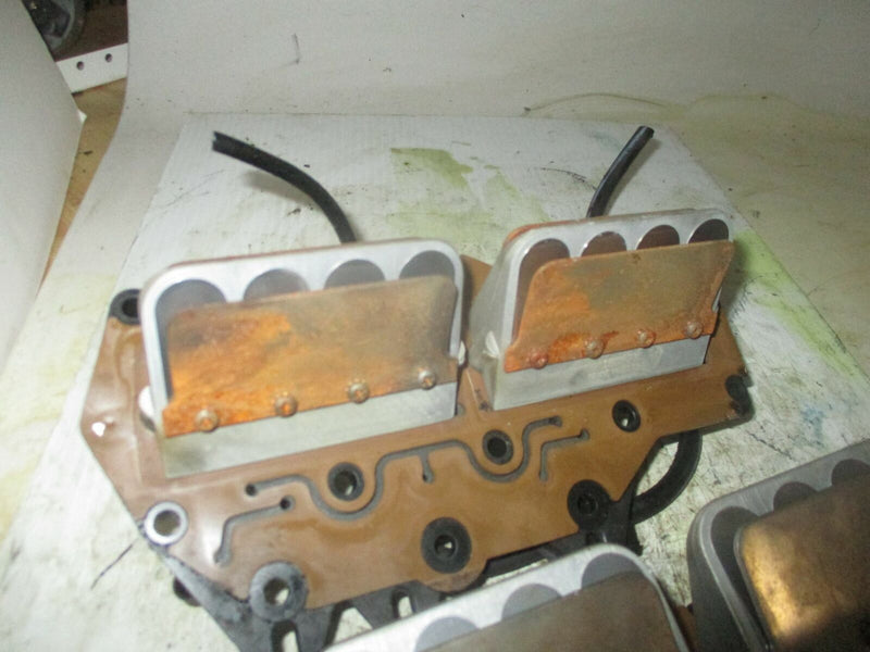 Evinrude 90hp 2 stroke outboard intake manifold with reeds