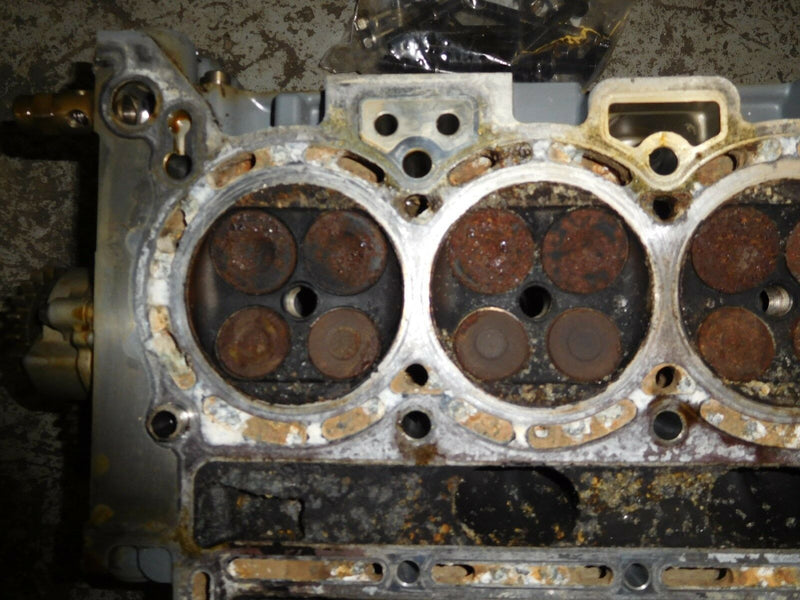 2004 johnson 90hp J90PL4SR cylinder head 4 stroke