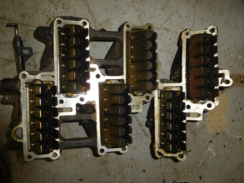 1988 Johnson J200TXCCR outboard intake manifold/reed valve set 332243, 332264