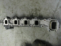 Load image into Gallery viewer, 2000 Suzuki outboard DF60 hp 06001F-031341 4-stroke exhaust manifold 14100-99800

