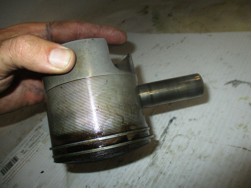 Suzuki DT225 225hp outboard port piston (12120-92E20)
