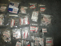 Load image into Gallery viewer, NEW OEM Suzuki outboard a box full of miscellaneous plastic and rubber hardware
