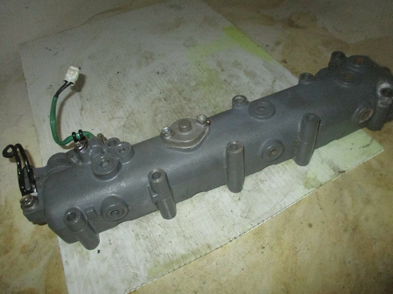 Suzuki DF70 70hp outboard exhaust manifold (14100-99800)