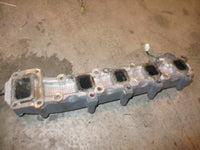 Load image into Gallery viewer, Suzuki DF70 70hp outboard exhaust manifold (14110-99E11)
