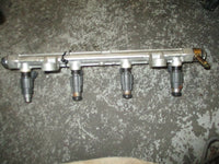 Load image into Gallery viewer, 2004 suzuki DF70 4-stroke outboard fuel rail with injector set 15751-99e00
