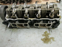 Load image into Gallery viewer, 1998 Suzuki Outboard DF 60 or 70 cylinder head 11100-99E05

