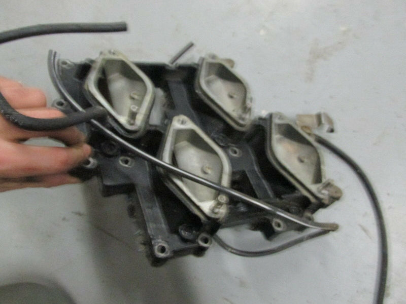 1998 Johnson J130TXACB outboard 2-stroke reed valve set intake manifold 0439042