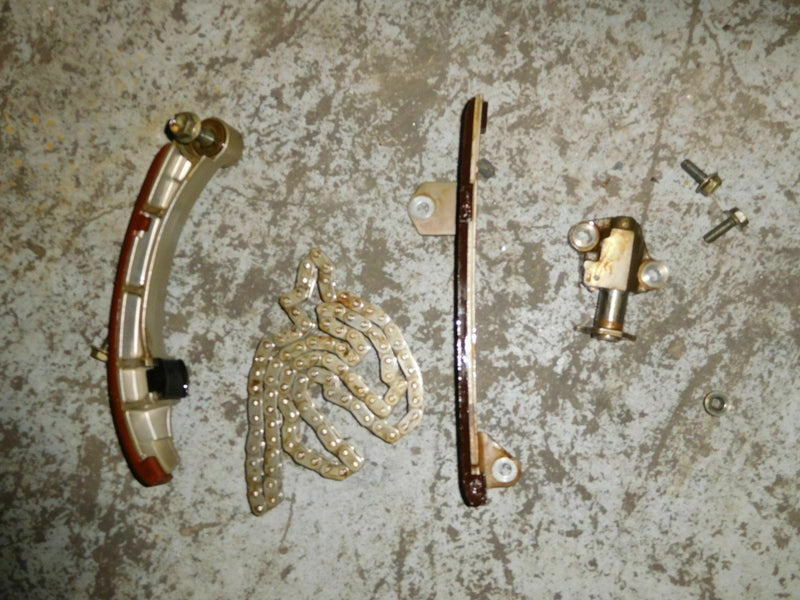 2004 johnson 90hp J90PL4SR timing chain, guide, and tensioner 5033662 5033666