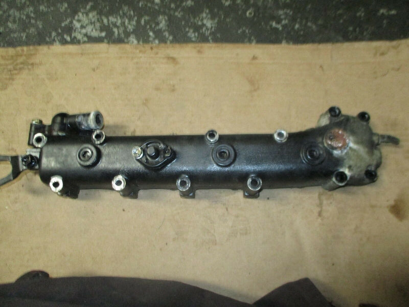 1998 Suzuki outboard 4-stroke DF 70 hp exhaust manifold 14110-99e11