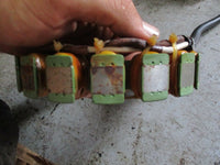 Load image into Gallery viewer, 2002 Suzuki outboard DF115 4 stroke 115hp Stator 32120-90j00
