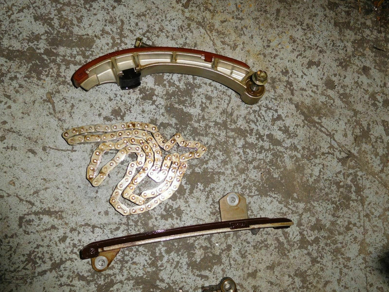 2004 johnson 90hp J90PL4SR timing chain, guide, and tensioner 5033662 5033666