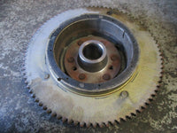 Load image into Gallery viewer, 1999 Suzuki DF50 outboard flywheel 32102-87j01
