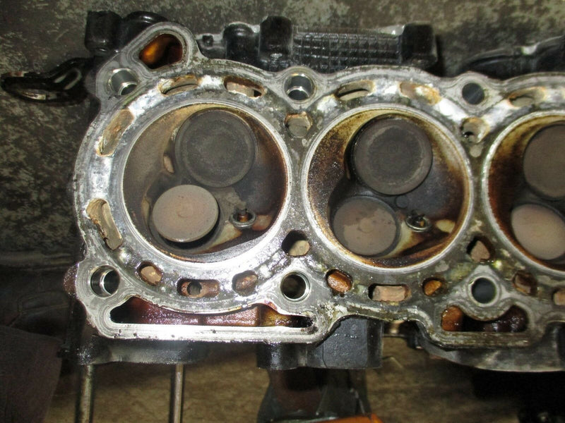 1998 Suzuki DF60 outboard 4-stroke cylinder head 11100-99e07