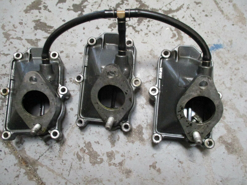 1989 Suzuki DT55TCLK 55hp outboard intake manifold with reeds 13150-94720