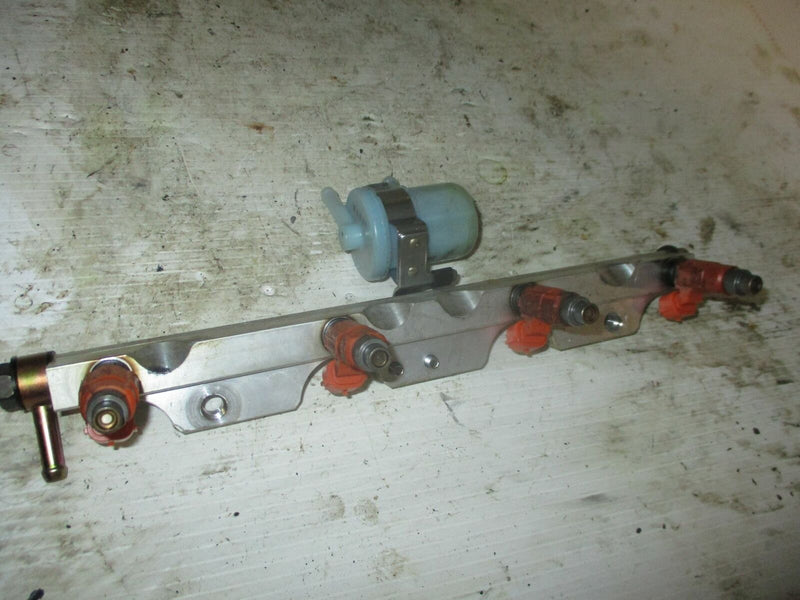 Suzuki 140hp 4 stroke outboard fuel rail with injector set (15751-90J03)