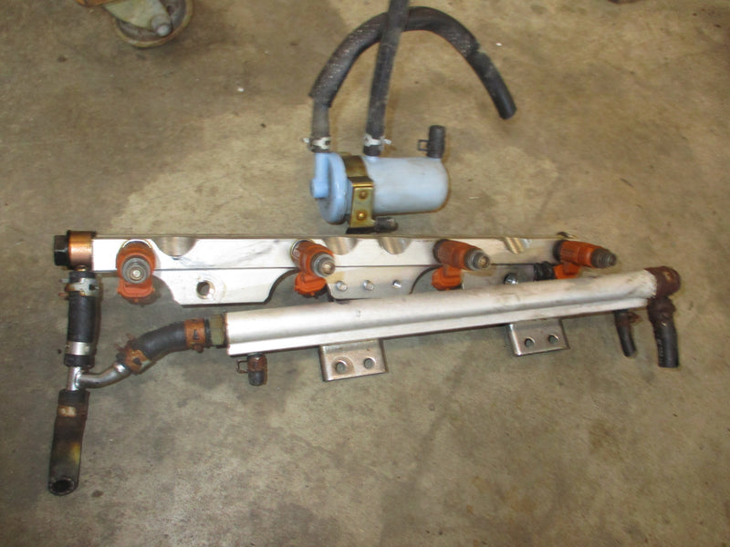 Suzuki DF140 140hp outboard fuel rail cooler and injector set (15751-90J03)