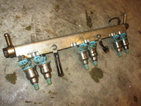 Load image into Gallery viewer, Suzuki DT200 200hp outboard fuel rail and injector set (15750-92E04)
