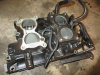 Load image into Gallery viewer, Evinrude 115hp 2 stroke outboard intake manifold with reeds (186549)
