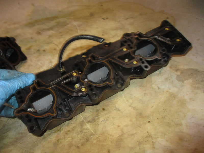 Evinrude 150hp 2 stroke outboard intake manifold with reeds (438956)