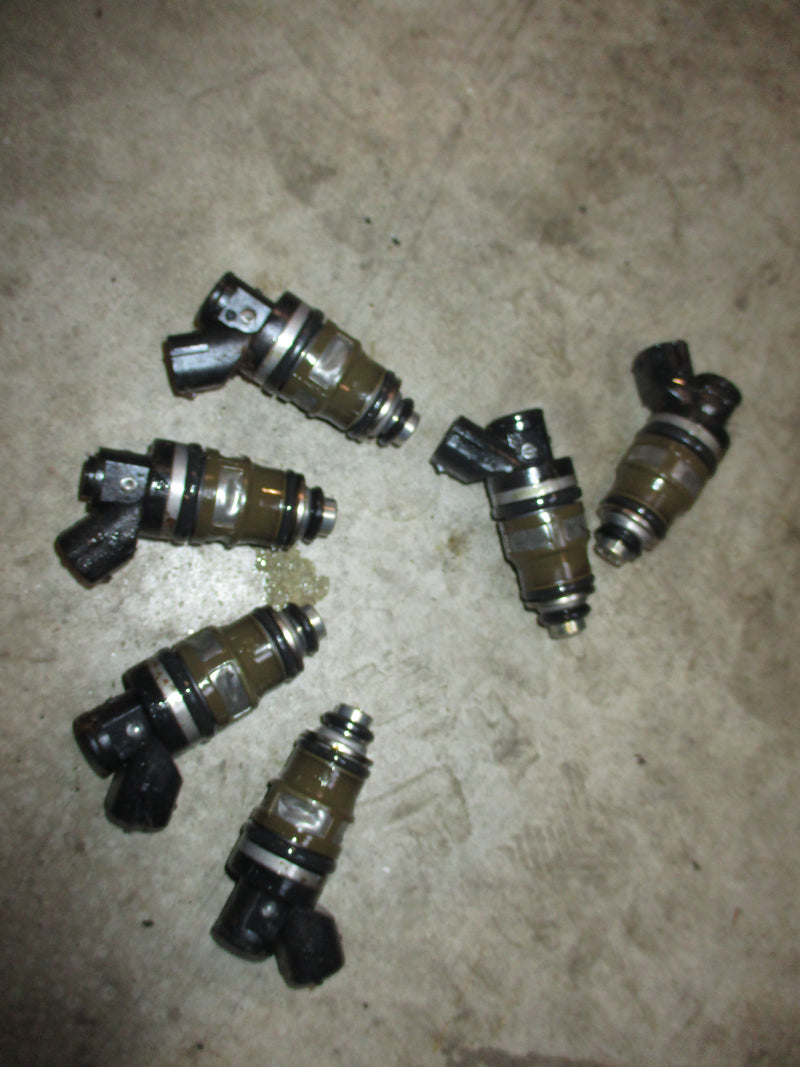 Suzuki DT150hp 2 stroke outboard fuel injector set (15710-94900)